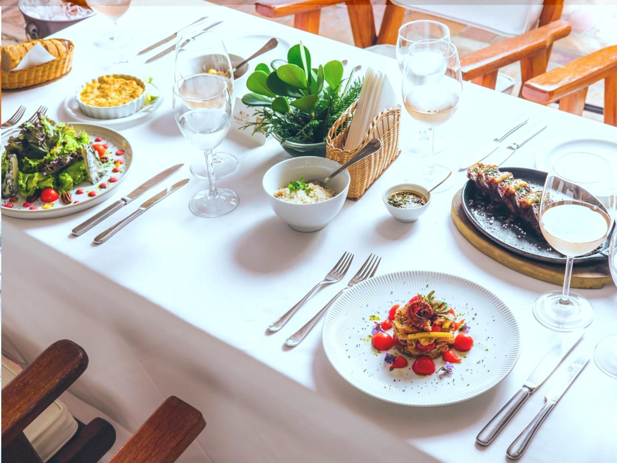 Dpny Beach Hotel & Spa Ilhabela Exterior foto A table set for fine dining